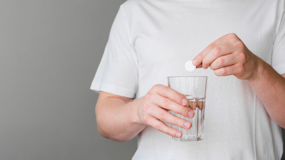 Tablet and a glass of water