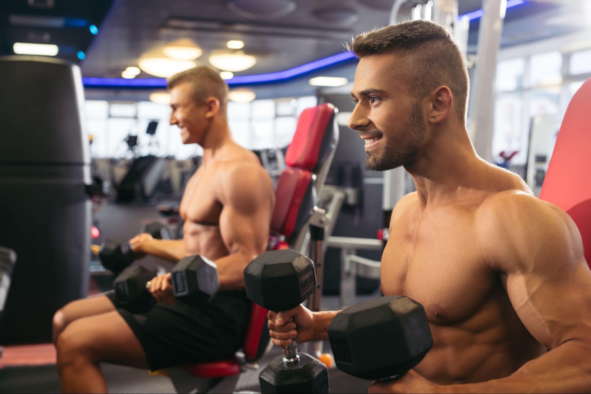 Active men at gym showing why multivitamin for men boosts energy